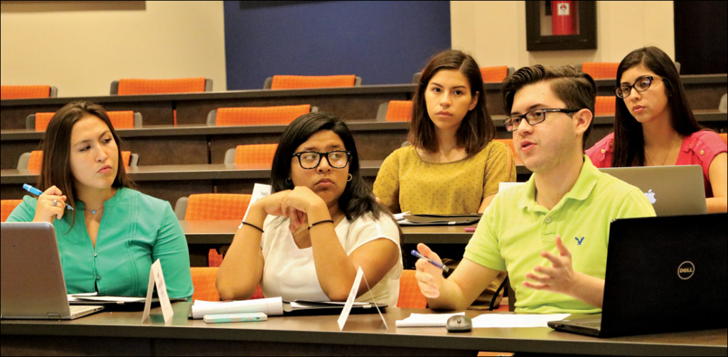 Senator At-Large Ernesto Farias (right) asks a question to Student Government Association President Denisse Molina-Castro during a meeting Sept. 9 on the Brownsville campus. The senate discussed the 2016-2017 SGA budget during new business. MICHELLE ESPINOZA/THE RIDER