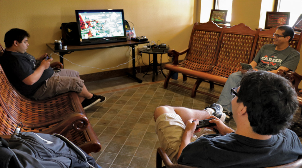 UTRGV students play Super Smash Bros Wii U during Game-A-Palooza June 16 in the Student Union’s La Sala on the Brownsville campus. The Student Union hosted the event. MICHELLE ESPINOZA/ THE RIDER 