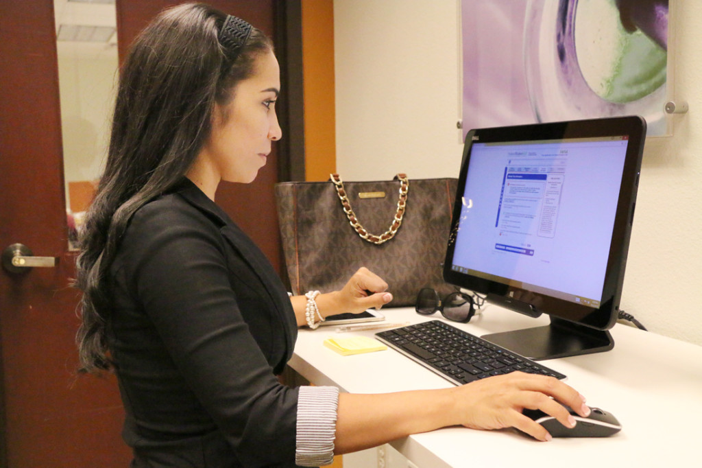 Aurora Benavides, who has an associate’s degree in respiratory therapy checks her transfer credits to enroll at UTRGV last Thursday at The Tower in Brownsville./Ana Cahuiche/ The Rider