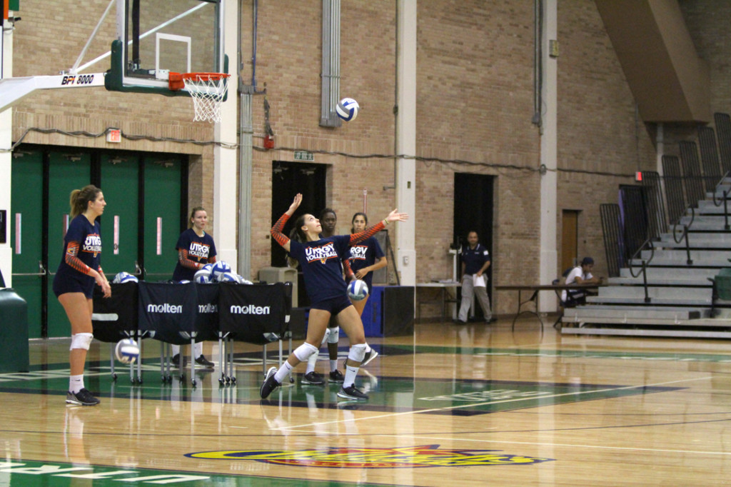 UTRGV outside hitter Fernanda Faustino sets up to practice her serve Aug. 29 in the UTRGV Fieldhouse. The team was preparing for its upcoming games in New Orleans./S arah Carvajal/The Rider