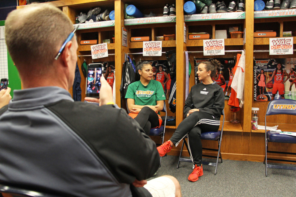 Basketball Operations Coordinator Scott Smith records forward Lile Havili and Assistant Coach Hannah Burleson for a “Live on the Net” session on Facebook Live and Periscope as part of the 100-day countdown to tipoff./Gabriel Mata/The Rider