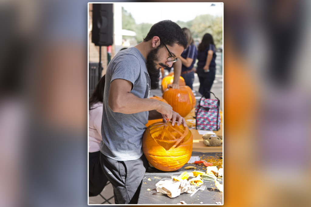 Studio art freshman Hugo Uribe carves his pumpkin during the Pumpkin Carving contest hosted by the Student Union during last year’s Fright Fest on the Edinburg campus./Lesley Robles/The Rider File Photo