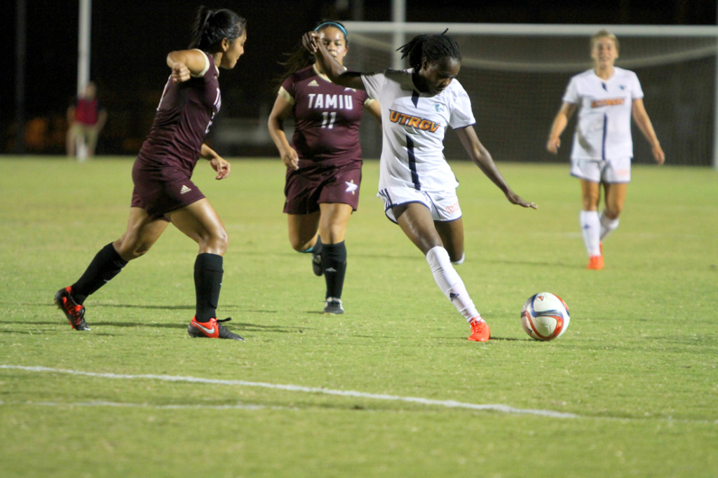 UTRGV freshman forward Sarah Bonney goes for a goal after passing two Texas A&M International University defenders during last Tuesday’s game at the UTRGV Soccer and Track & Field Complex in Edinburg. The women’s soccer team began WAC play this past weekend./Sarah Carvajal/The Rider