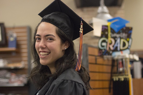 A picture of a graduate with a cap and gown