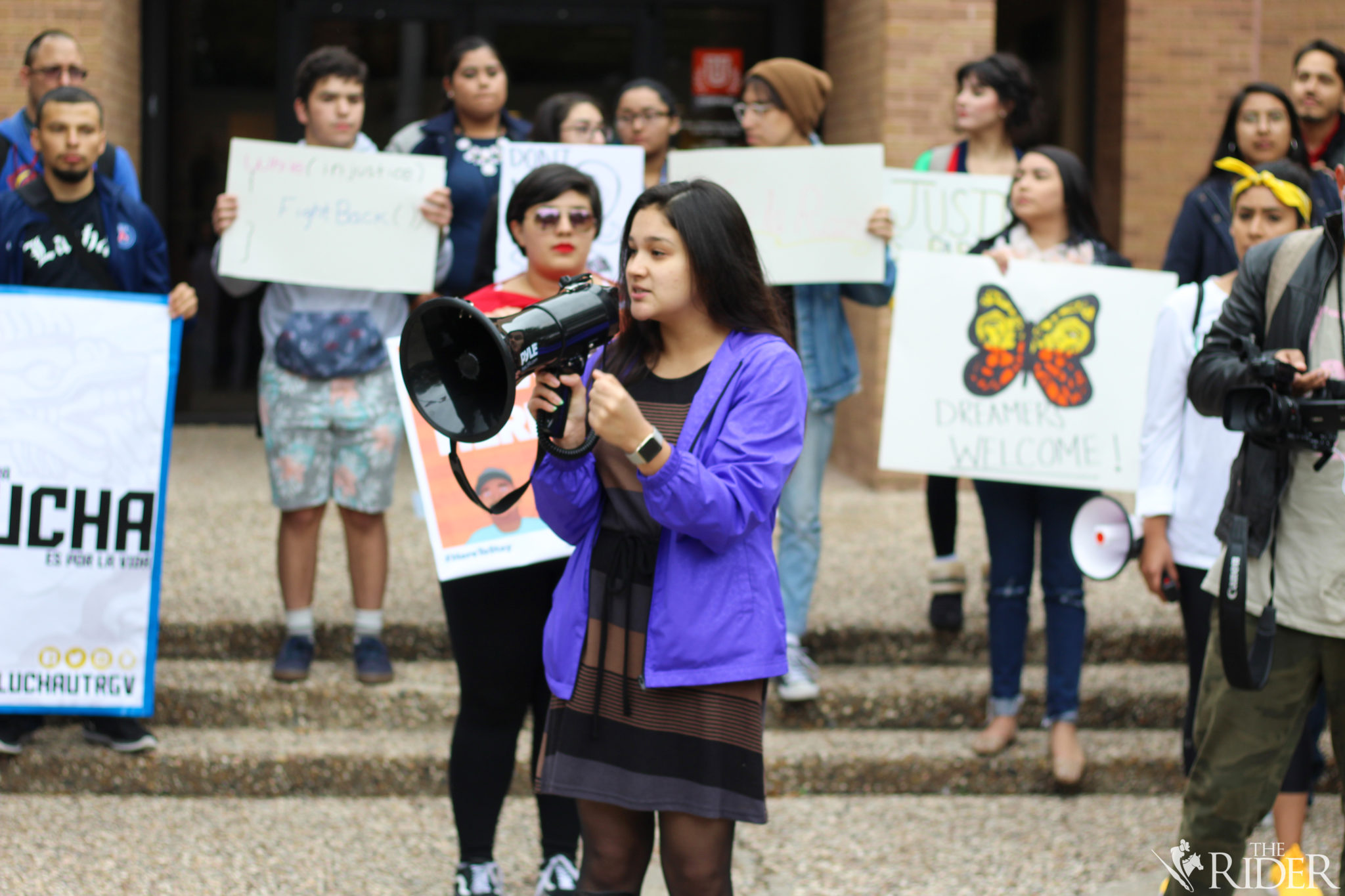 Alondra Galvan, president of the UTRGV Student Government Association, speaks during the rally of the “Solidarity Walkout.” Protesters asked Galvan if the SGA can pass a resolution to create a Dreamer Center at UTRGV. She responded by saying she and the SGA are willing to meet with students.