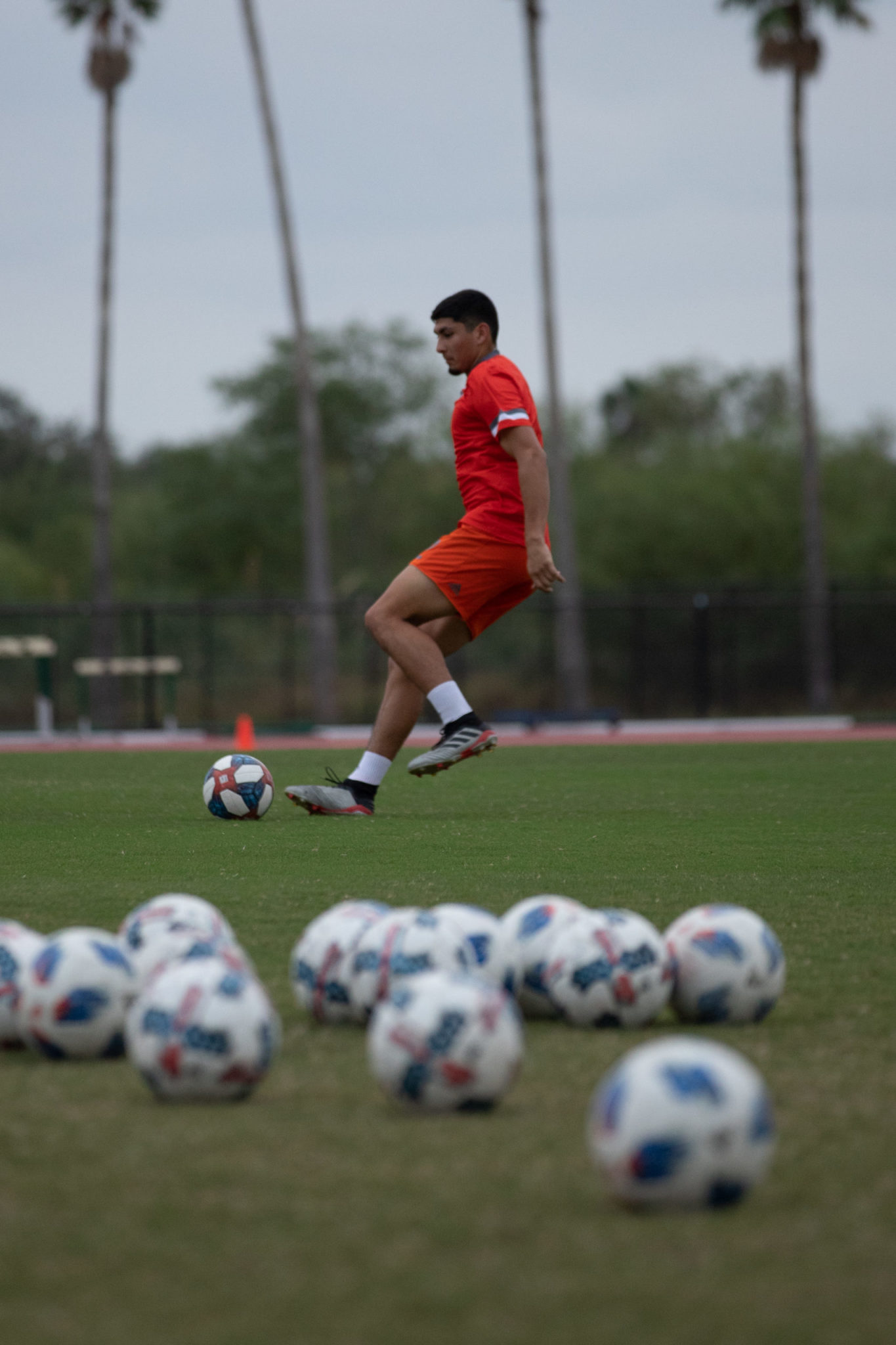 UTRGV Soccer player Issac Ochoa playing soccer.