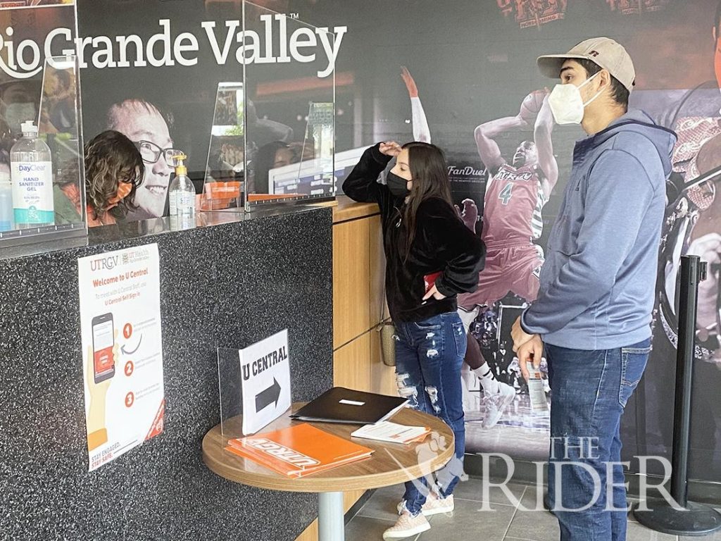 Kinesiology sophomore Alexandra Gomez (center) and mechanical engineering sophomore Abel Gomez wait in line last Tuesday at the Student Services building. In the last two years, several new programs have been added to the Graduate College. The on-campus programs include a master’s in business analytics, applied statistics and data science, biochemistry and molecular biology. Aaliyah Garza/The Rider