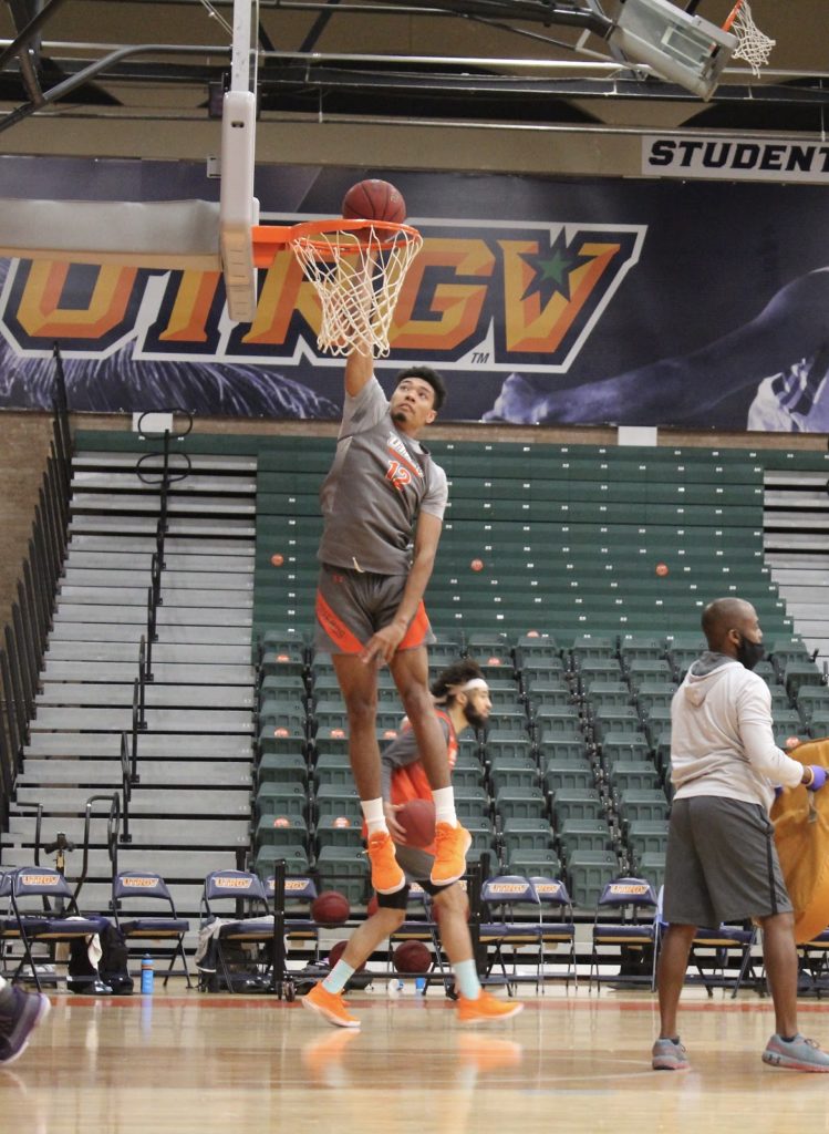 UTRGV basketball player, Rob McClain Jr., shoots a layup 