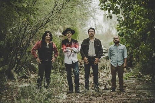 The Riverside Boys pose during a photoshoot. Shown are (from left) lead guitarist and civil engineering senior Isaac Bazan, bassist Dante Chavez, drummer and civil engineering junior Aaron Peña and guitarist Aaron Perez. Photo Courtesy The Riverside Boys