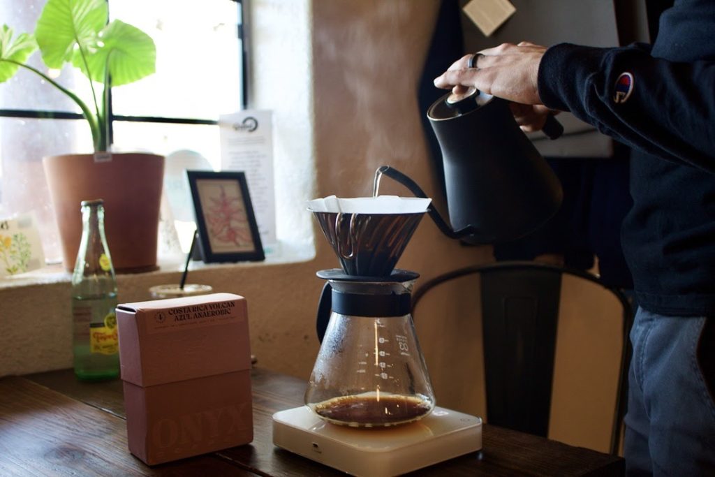 Grind Coffee Co. barista Michael Flores prepares coffee at the shop on March 10. Jacqueline Wallace/The Rider