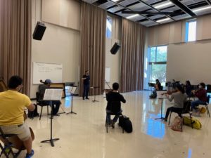 Samuel Pasqualetto, a graduate student in applied conducting, conducts during a rehearsal with some of the members of the UTRGV Symphony Orchestra. Photo Courtesy Norman Gamboa