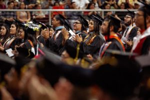 For Page 1 Students applaud during the Dec. 14, 2019, Winter Commencement for the College of Education and P-16 Integration, College of Engineering and Computer Science and College of Sciences at the Bert Ogden Arena in Edinburg. Silver Salas/University Marketing and Communications