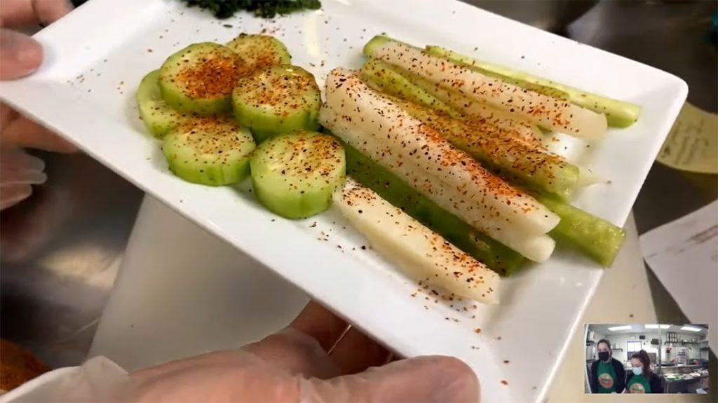 Agricultural and sustainability graduate student Gabriela Flores and marketing freshman Jessica Garza were the Food Preparation Team last Tuesday for the Sustainable Table Webinar Series- Snacks and Cravings. One of the snacks prepared during the livestream was a mix of jicama and cucumber topped with lime juice and chilli powder.