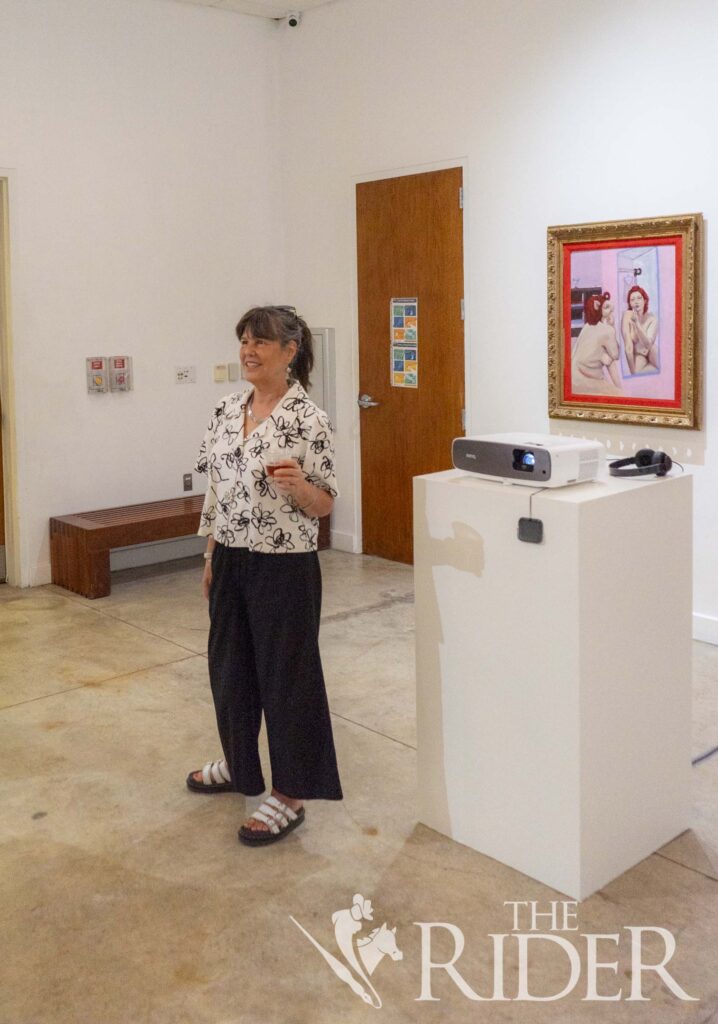 Brownsville resident Janet Evans tells The Rider that every time she goes to an exhibit, she tries to pick out her three favorites. “Brick by Brick,” from what she sees, is “incredible.” Eduardo Escamilla/THE RIDER