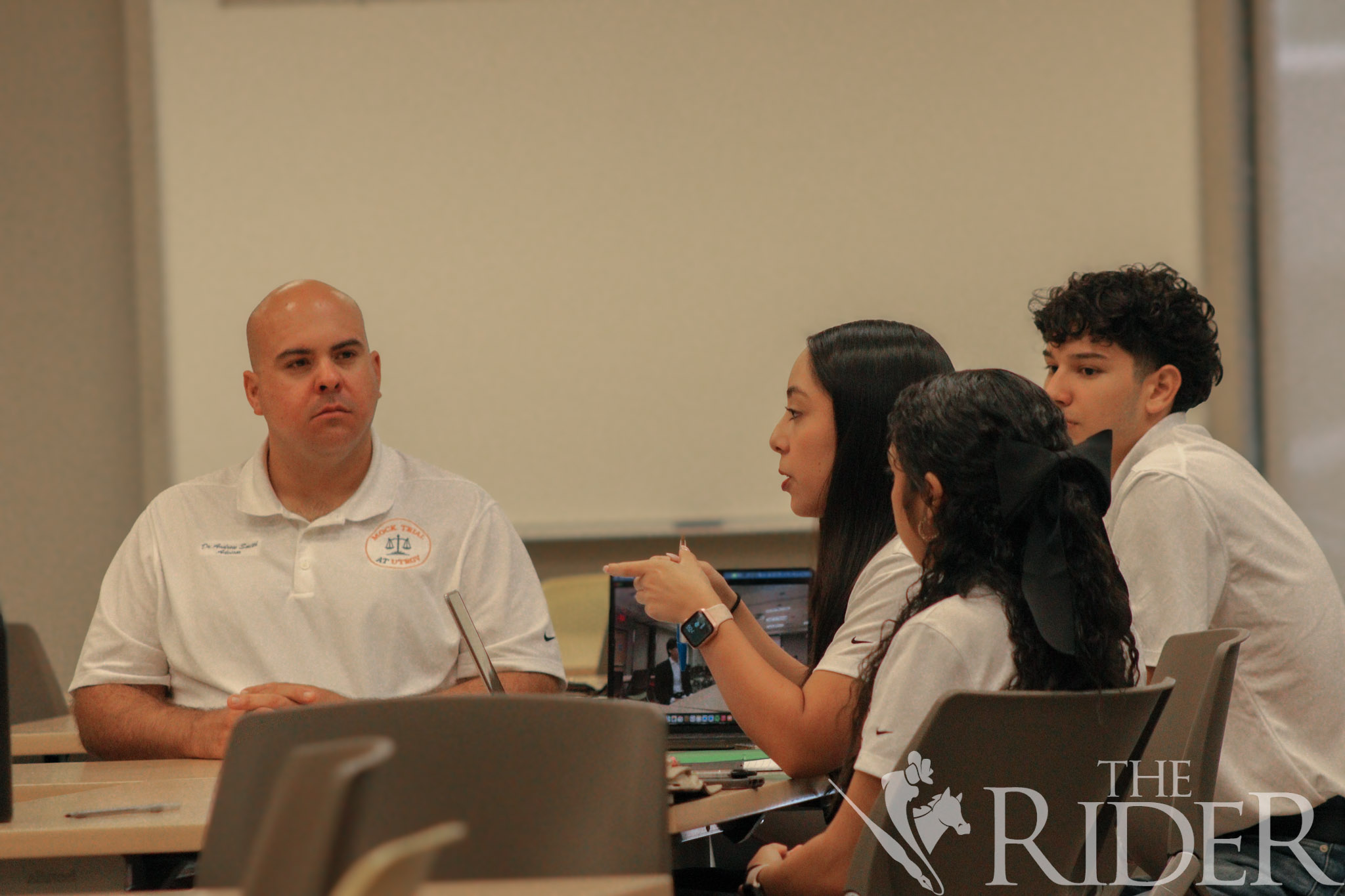 UTRGV Mock Trial Competition Team President and Mexican American studies senior Izabella Gaytán interviews a candidate during tryouts Wednesday in the Student Academic Center on the Edinburg campus. Abigail Ollave/THE RIDER