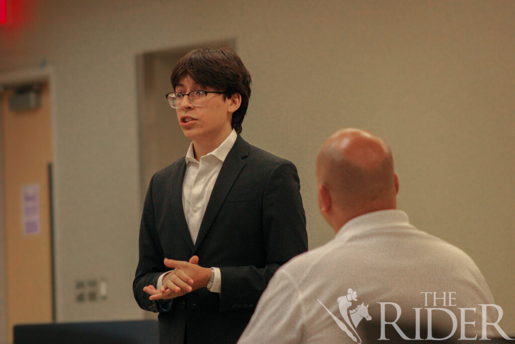 David Aguirre, an electrical engineering junior, recites his opening statement during his tryout for the UTRGV Mock Trial Competition Team Wednesday in the Student Academic Center on the Edinburg campus. Abigail Ollave/THE RIDER