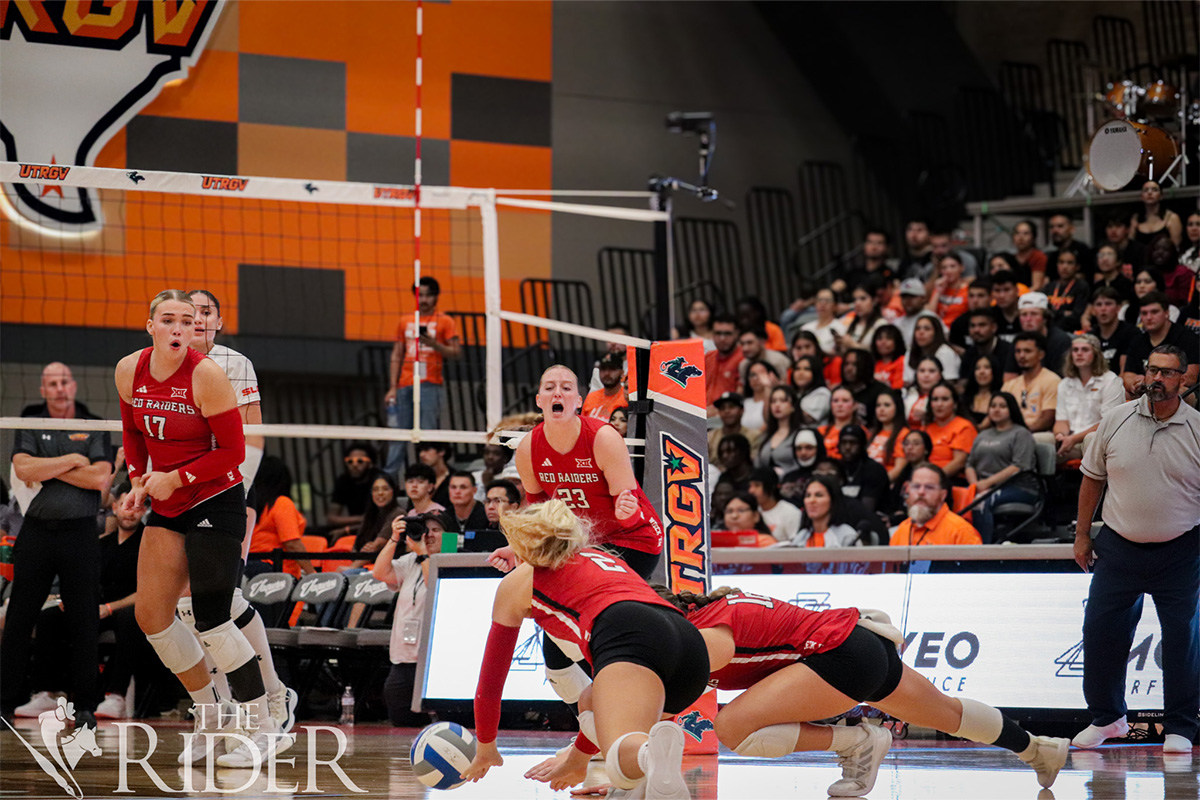 The Raiders react to a kill by the Vaqueros during tonight's sold-out match in the UTRGV Fieldhouse on the Edinburg campus. The Vaqueros lost 3-2. Abigail Ollave/THE RIDER