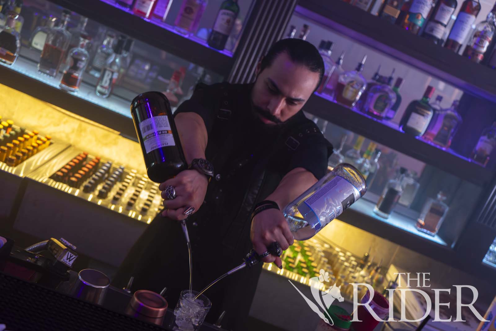 The bartender, known by patrons as “Vampire,” mixes a cocktail at The Flying Walrus during a cosplay event Aug. 30. Eduardo Escamilla/THE RIDER