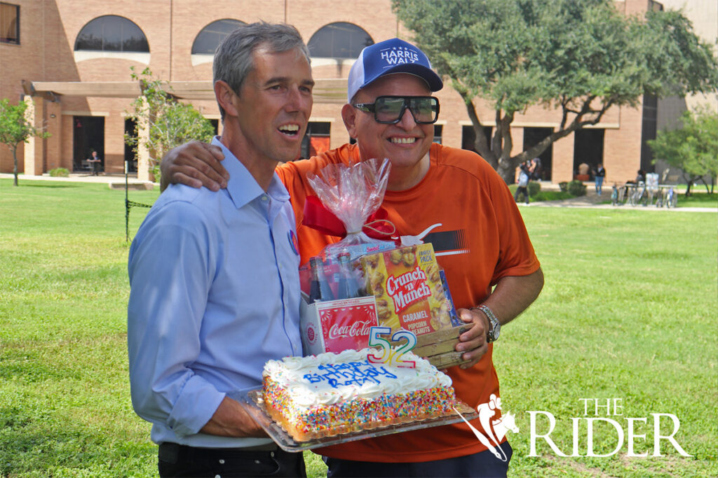 Weslaco resident Luciano “Chano” Garza surprises former Democratic U.S. Rep. Beto O’Rourke with a cake and snacks for his birthday Thursday at the Chapel Lawn on the Edinburg campus. Angel Ballesteros/THE RIDER