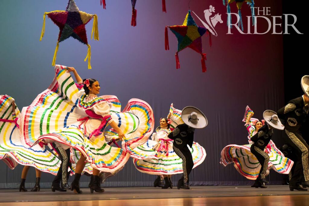 Members of the Ballet Folklórico at UTRGV dance in traditional folklórico dresses made in Jalisco, Mexico, during the performance of “Leyendas” Sept. 7 in the Performing Arts Complex on the Edinburg campus. Eduardo Escamilla/THE RIDER