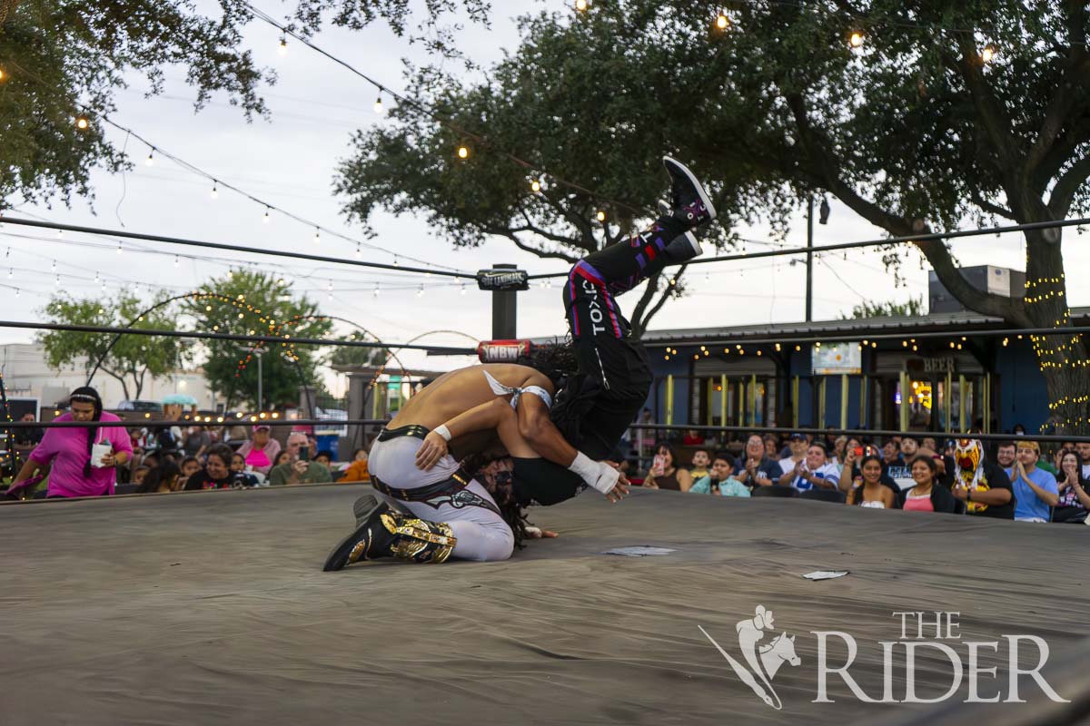 Keke Caballero flips over his opponent Ulysses “El Tóxico” Garcia during a match promoted by New Breed Wrestling on Sept. 8 at the Landmark on Tower, located at 103 N. Tower Road in Alamo. Eduardo Escamilla/THE RIDER