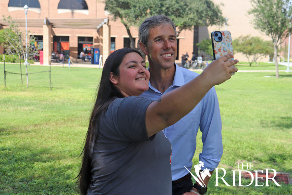 Medical and health humanities sophomore Laura Mendoza takes a selfie with former Democratic U.S. Rep. Beto O’Rourke Thursday at the Chapel Lawn on the Edinburg campus. O’Rourke visited the university as a part of his Ready to Vote Tour. Angel Ballesteros/THE RIDER