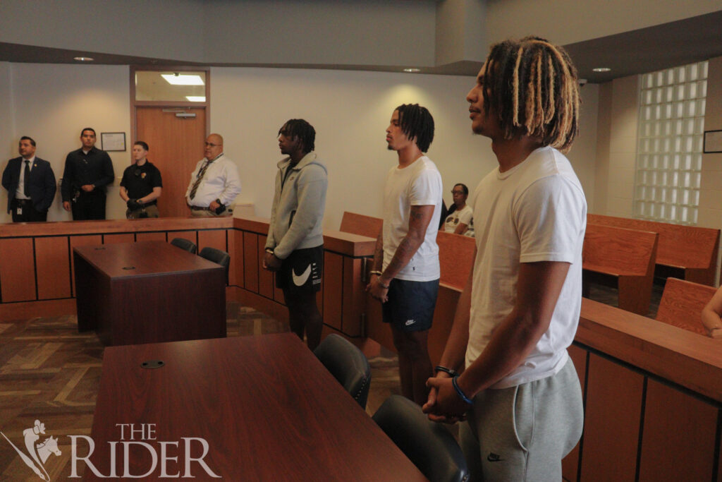 Nineteen-year-old Juan Taylor (from left), 18-year-old Jaeden Servantez and 19-year-old Robert Brown listen earlier today during their arraignment at the Edinburg Municipal Court. The three were arrested for a hit-and-run with a cyclist. Fatima Gamez/THE RIDER