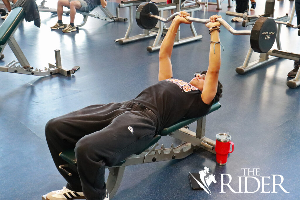 Criminal justice junior Alvaro Valdez exercises Aug. 26 in the University Recreation center on the Edinburg campus. Angel Ballesteros/THE RIDER