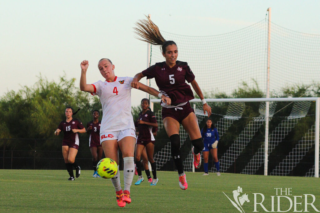 Vaqueros senior midfielder Sam Maudsley and Texas Southern University sophomore forward Isabella Dillow fight for the cross in the Aug. 15 season opener at the UTRGV Soccer and Track & Field Complex on the Edinburg campus. THE RIDER FILE PHOTO