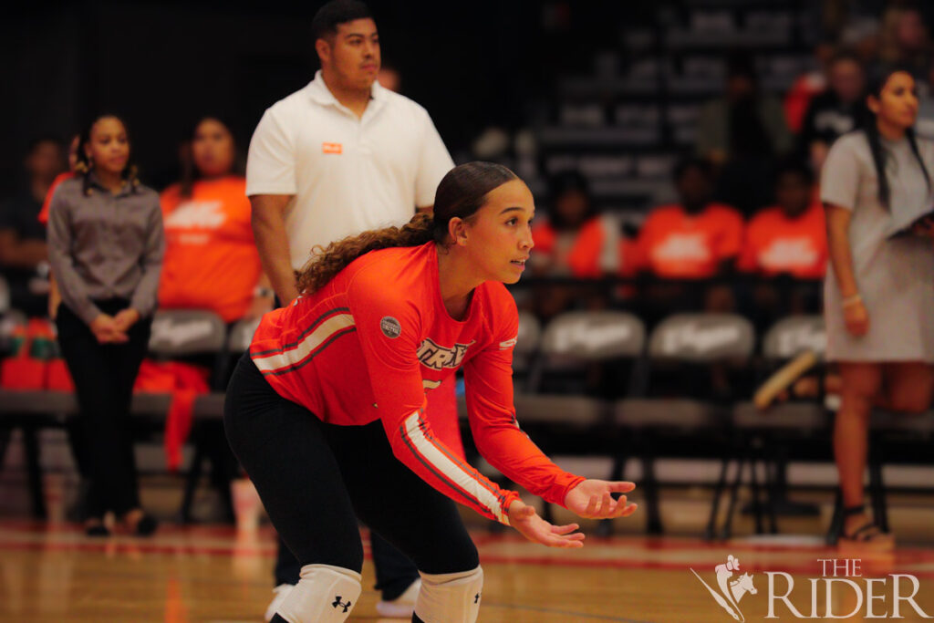 Vaqueros sophomore Celianiz Cabranes prepares to receive a serve last Tuesday in a match against the Texas A&M University-Corpus Christi Islanders in the UTRGV Fieldhouse on the Edinburg campus. Abigail Ollave/THE RIDER