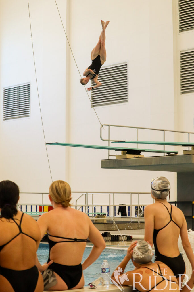 Vaqueros junior diver Delaney Murphy performs her routine for the 3-meter springboard event during the Orange & Gray Intrasquad Meet Sept. 28 in the Pharr-PSJA-UTRGV Natatorium. Abigail Ollave/THE RIDER